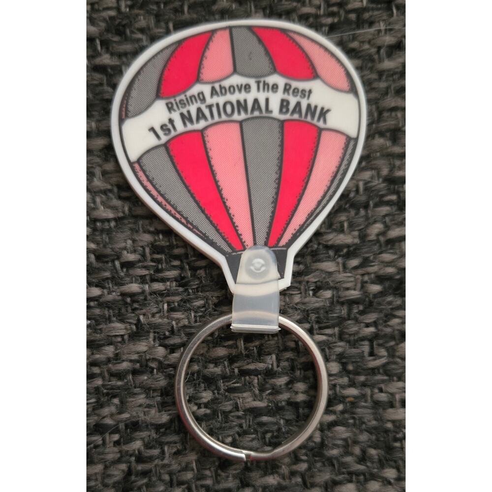 Vintage Soft Rising Above the Rest 1st National Bank Keychain